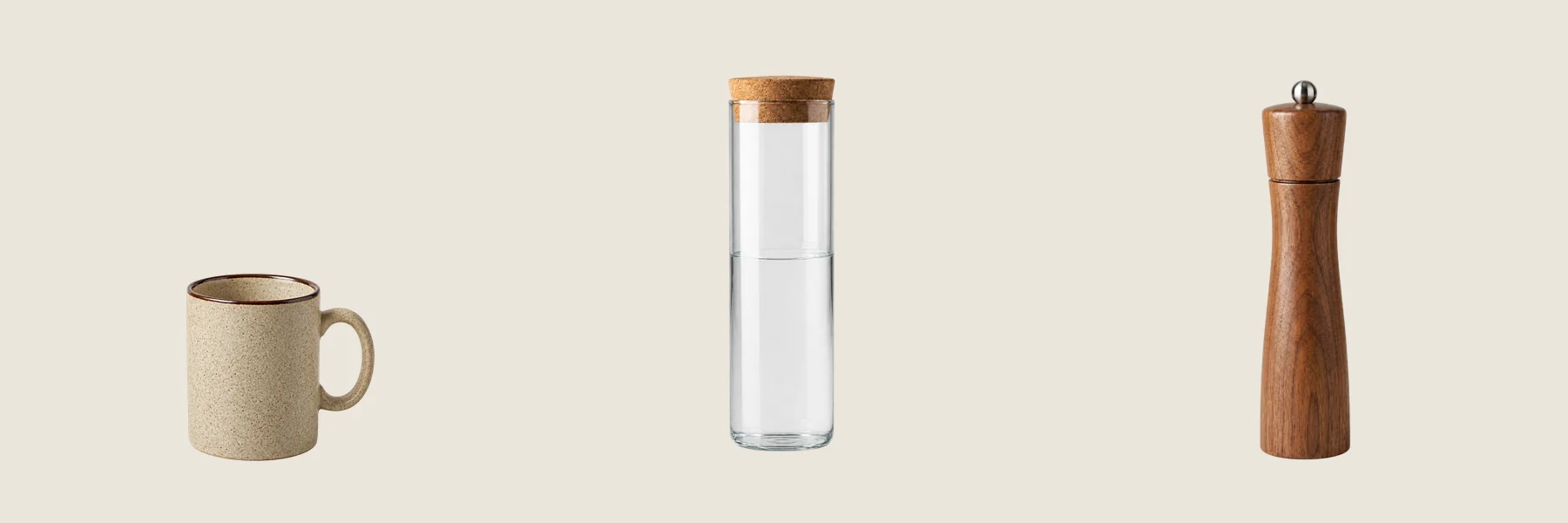 The mug, carafe and pepper mill as transparent cut-outs placed on one identical flat cream background