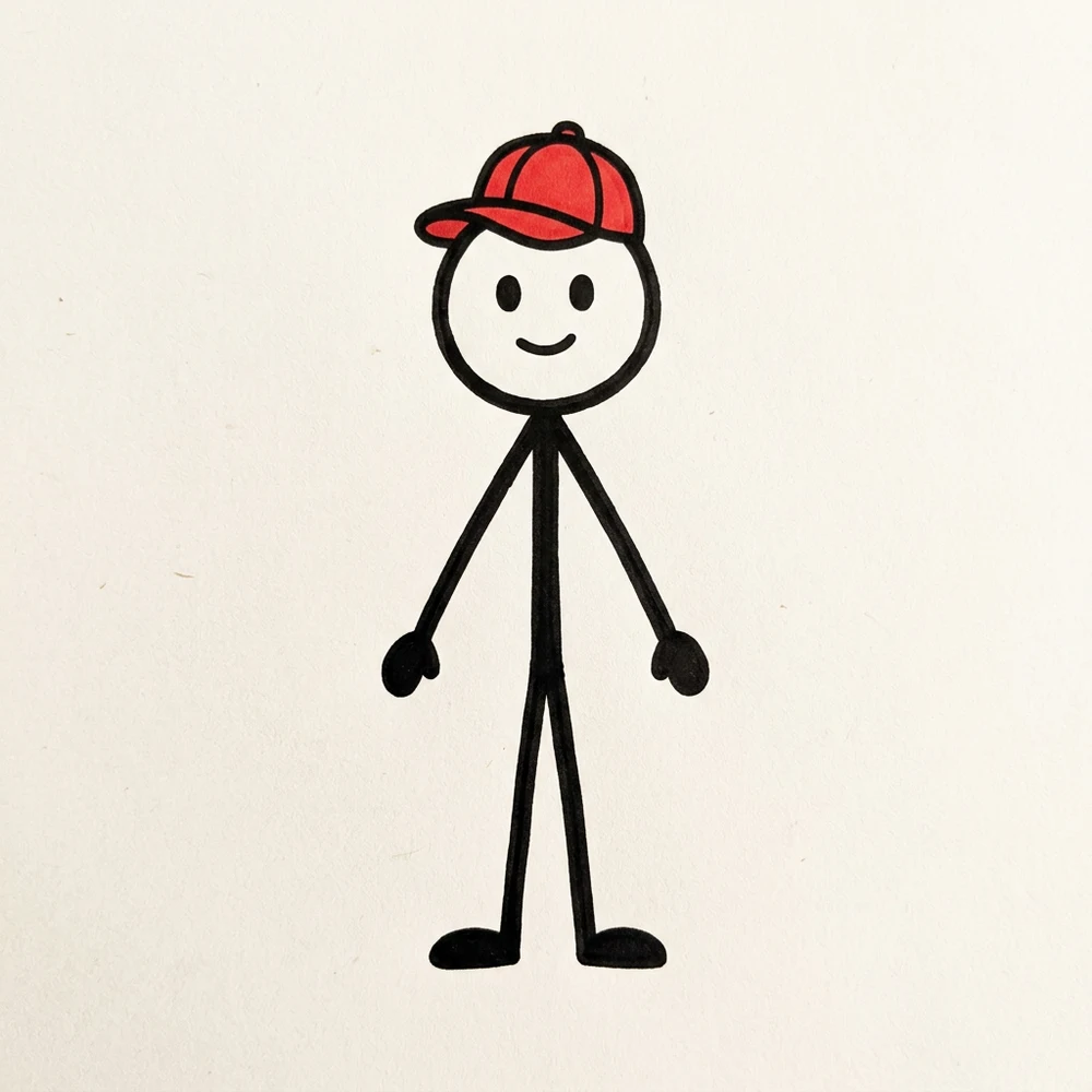 The character sheet: a hand-drawn stick figure with a round white head, two dot eyes, a small smile, a red baseball cap, solid black mitten hands and oval feet, standing on plain off-white paper